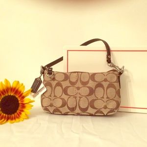 *Brand New Coach wristlet with tags